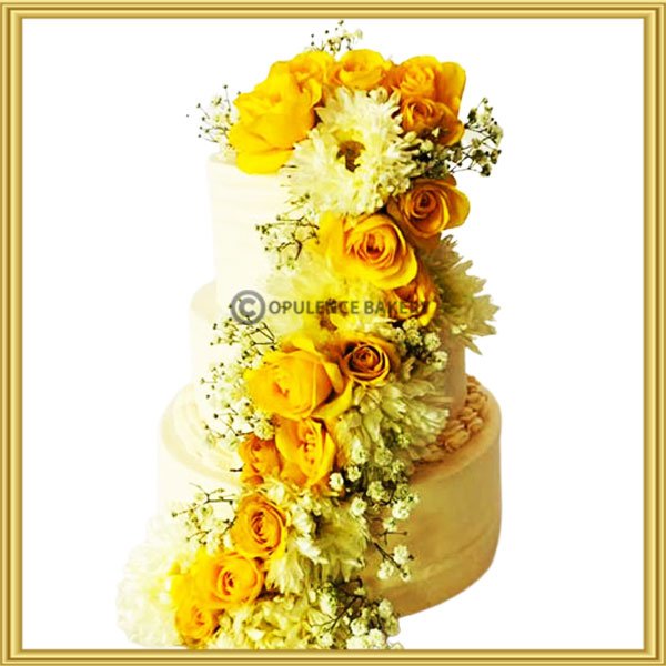 Premium Photo | Closeup of yellow flowers decorating vanilla cake topped  with white chocolate ganache.