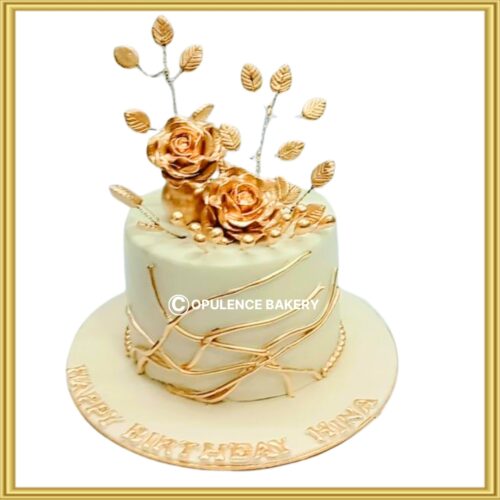 Designer gold rose luxury theme birthday cake in Lahore by Opulence Bakery.