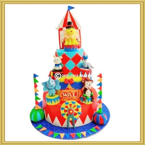 Custom multi-tiered circus theme birthday cake in Lahore with 3D animals and ferris wheel by Opulence Bakery.
