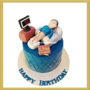 Custom lawyer birthday cake with 3D sleeping figure, law books, and Netflix TV topper in Lahore