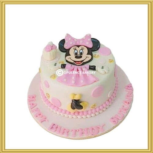 Designer Minnie Mouse theme birthday cake for girls in Lahore by Opulence Bakery.