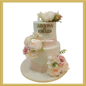 Custom 2 tier elegant floral wedding and engagement cake with blush pink roses in Lahore