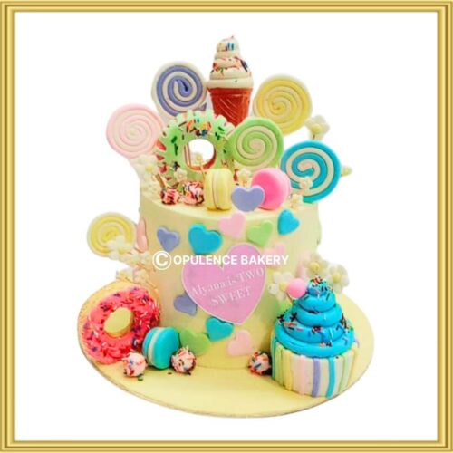 Candyland two sweet birthday cake in Lahore with lollipops, donuts, and ice cream toppers