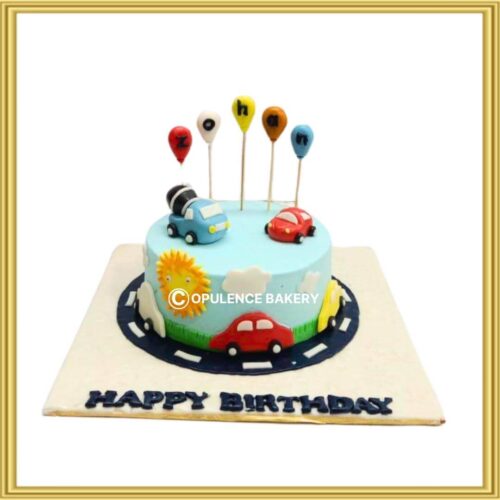 Custom car and vehicle theme birthday cake with 3D cars and balloon name toppers in Lahore