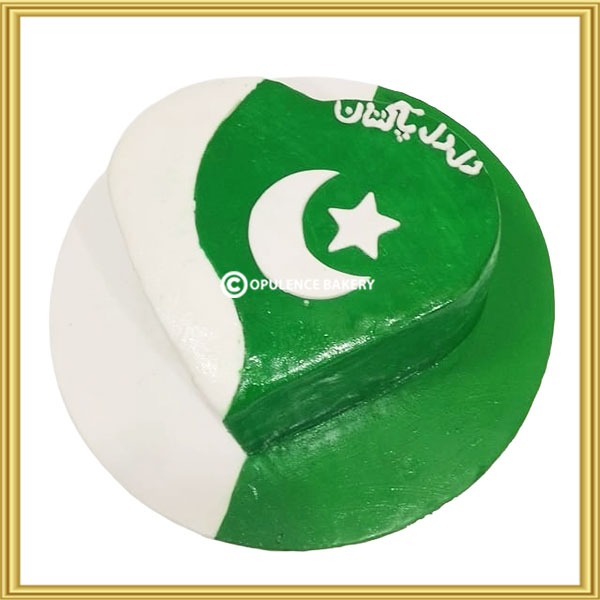 Heart-shaped Pakistan flag cake with Dil Dil Pakistan Urdu script in Lahore by Opulence Bakery.
